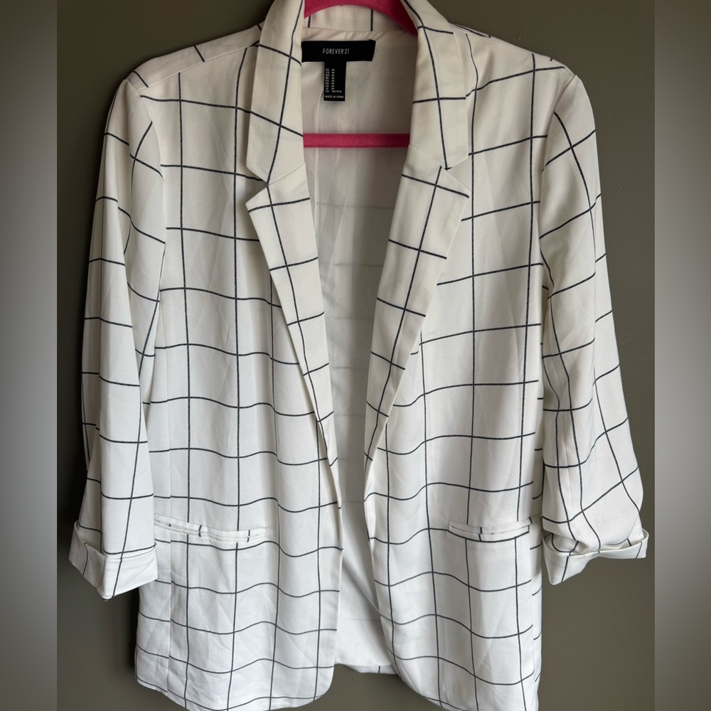 White and black blazer. Size medium.